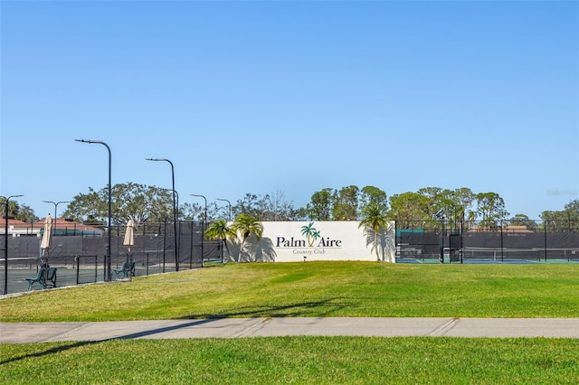 view of home's community featuring a lawn