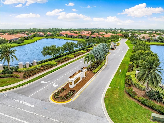 drone / aerial view with a water view