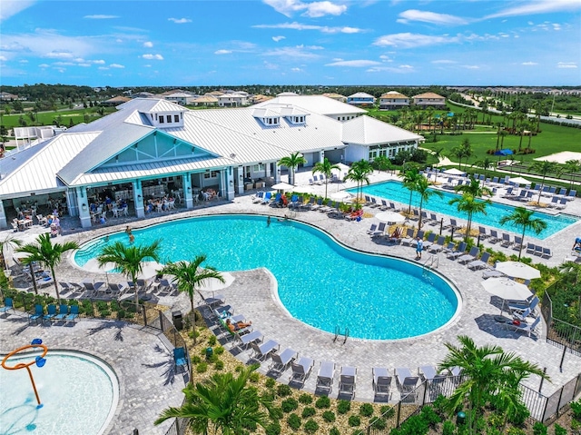 view of pool featuring a patio