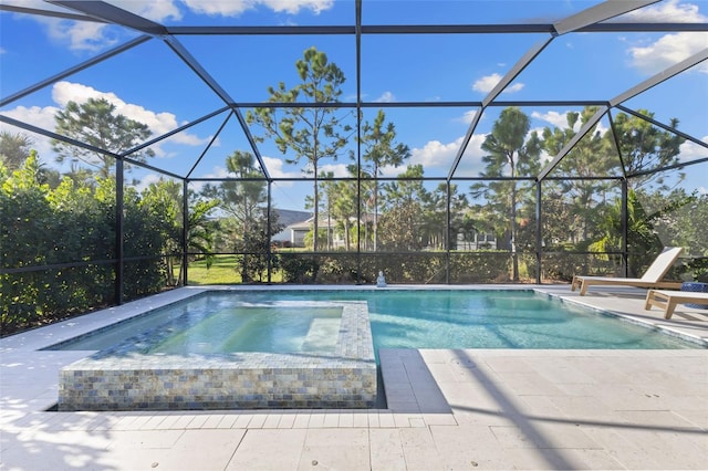 view of pool featuring an in ground hot tub, a lanai, and a patio