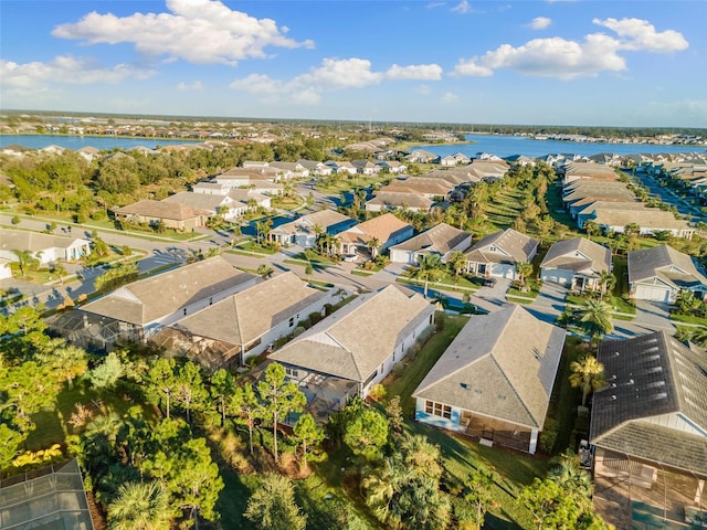 drone / aerial view with a water view