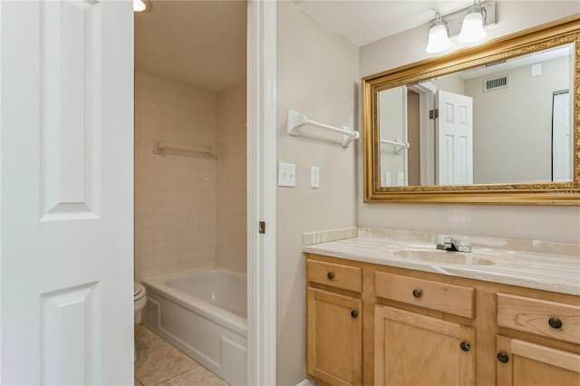 full bathroom with tile patterned floors, vanity, toilet, and shower / washtub combination