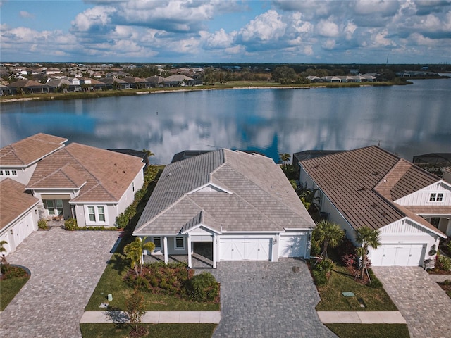 drone / aerial view with a water view