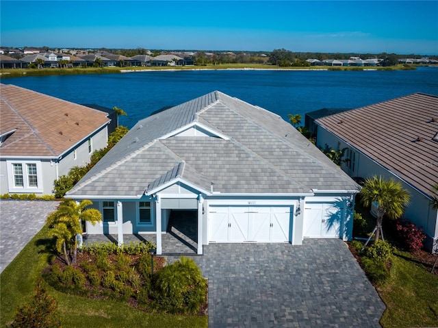 drone / aerial view with a water view