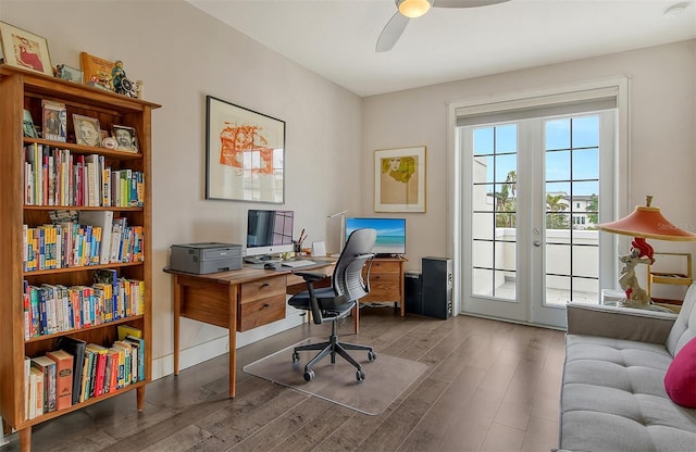 office area with hardwood / wood-style flooring, ceiling fan, and french doors