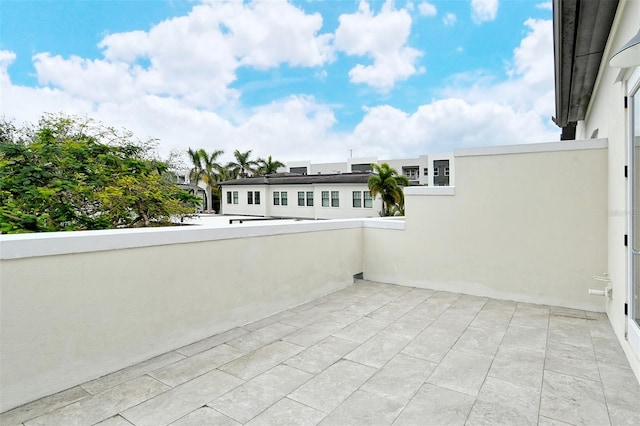 view of patio with a balcony