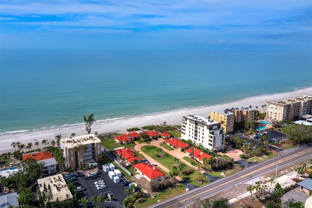 aerial view featuring a view of the beach and a water view