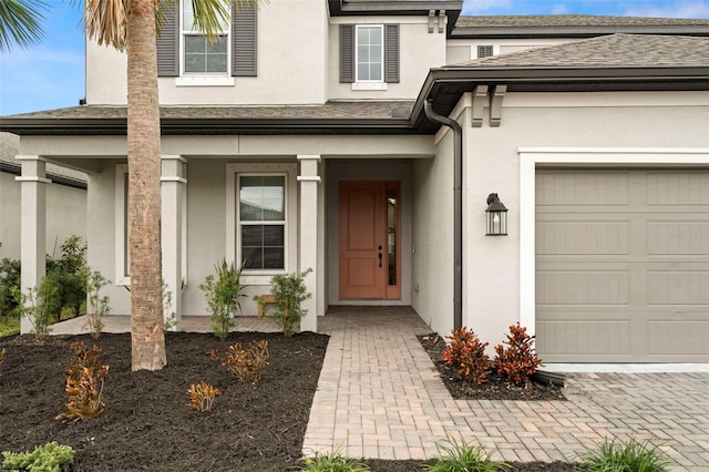 property entrance featuring a garage