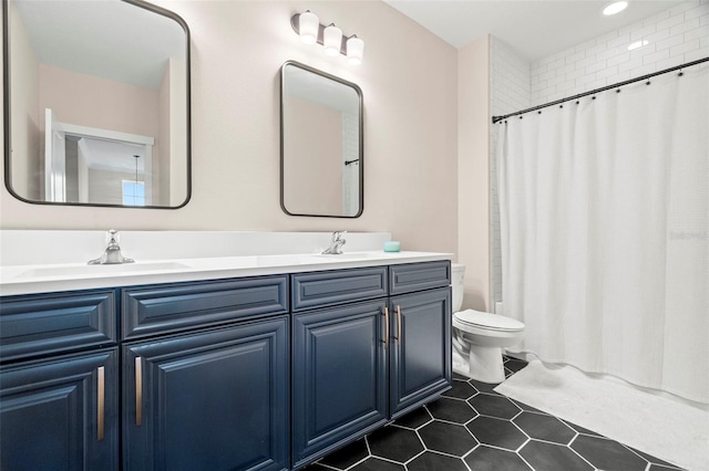 1012 Fernleaf Run, Bradenton, FL 34212 - bathroom featuring double vanity, toilet, shower / bathtub combination with curtain, tile patterned flooring, and recessed lighting