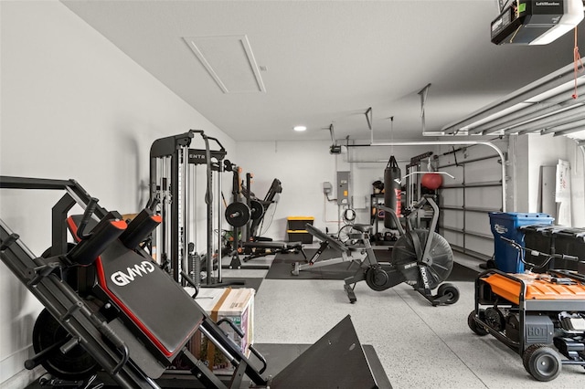 1012 Fernleaf Run, Bradenton, FL 34212 - workout area with electric panel and attic access