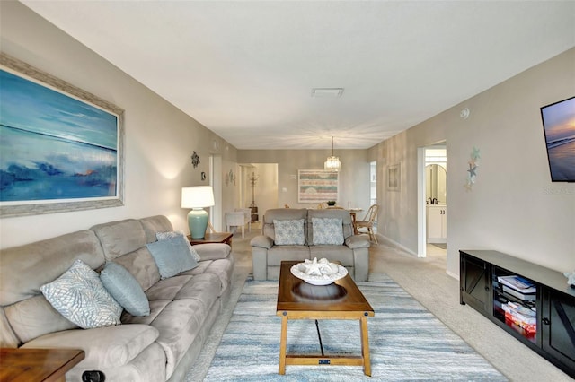 living room featuring light colored carpet