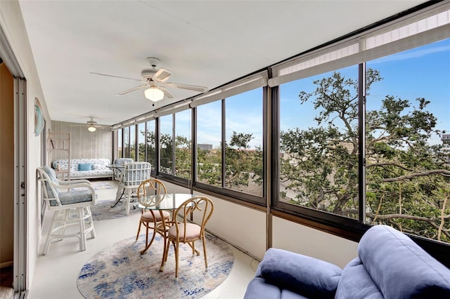 sunroom / solarium with ceiling fan