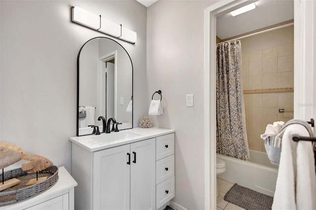 full bathroom with vanity, tile patterned floors, shower / bath combination with curtain, and toilet