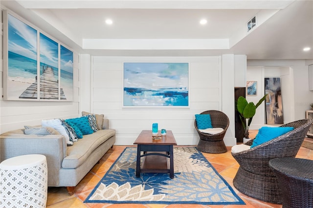 living room with tile patterned flooring