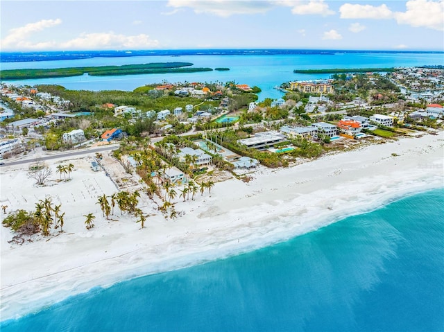 aerial view featuring a water view and a beach view