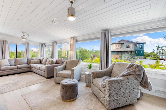 sunroom with wooden ceiling