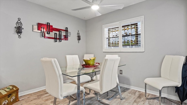 dining room featuring hardwood / wood-style flooring and ceiling fan