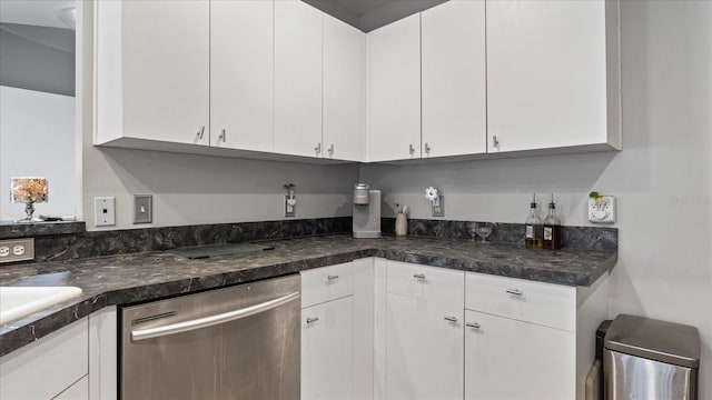 kitchen featuring white cabinets and dishwasher