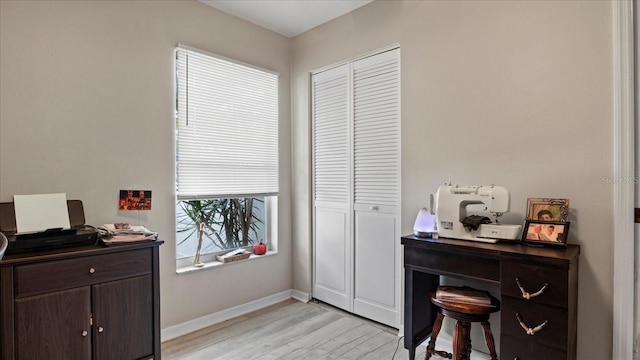 interior space featuring light wood-type flooring and a wealth of natural light