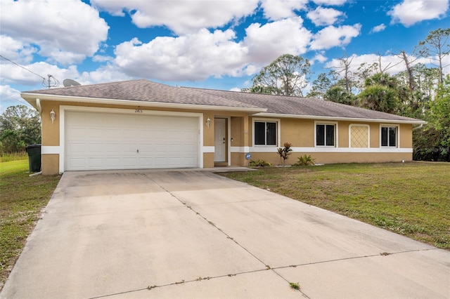 ranch-style house featuring a garage and a front lawn