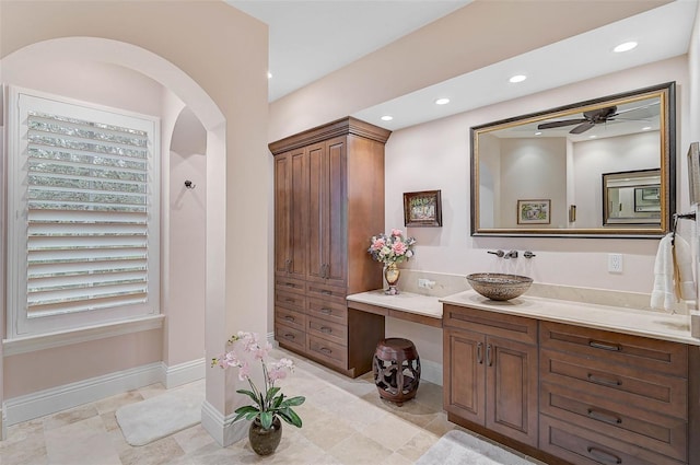 bathroom with vanity and ceiling fan