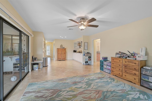 tiled bedroom featuring ceiling fan