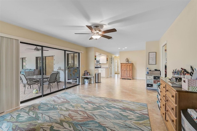 tiled living room with ceiling fan