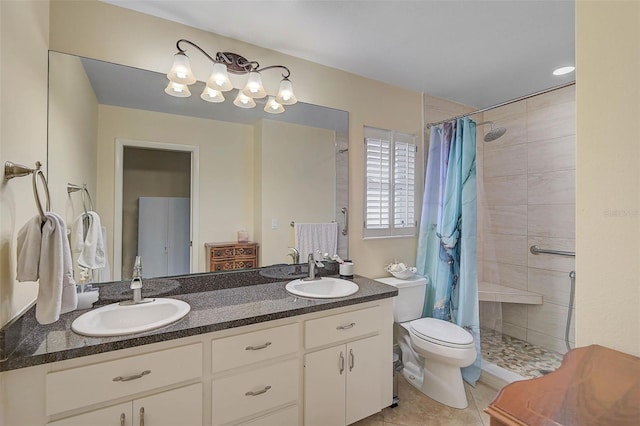 bathroom with vanity, tile patterned flooring, toilet, and a shower with shower curtain