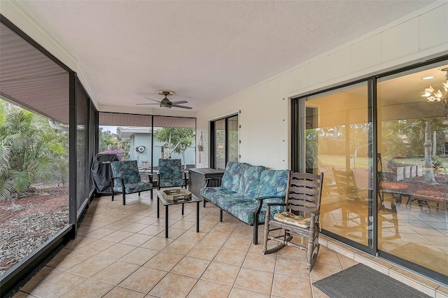 sunroom / solarium with ceiling fan