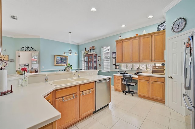 kitchen featuring stainless steel appliances, crown molding, sink, and decorative light fixtures