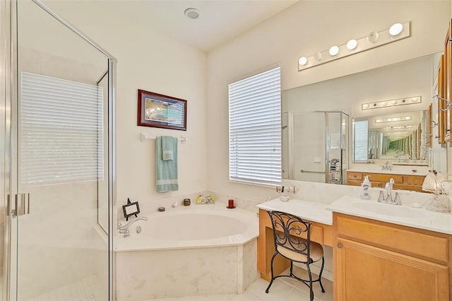 bathroom featuring tile patterned floors, vanity, and plus walk in shower