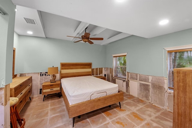 bedroom with vaulted ceiling with beams