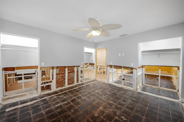 unfurnished room featuring ceiling fan