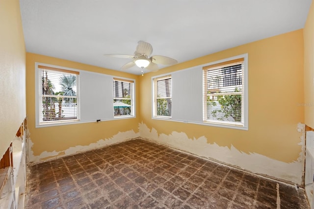 spare room featuring ceiling fan