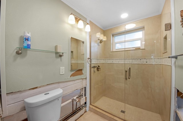 bathroom featuring an enclosed shower, ornamental molding, and toilet