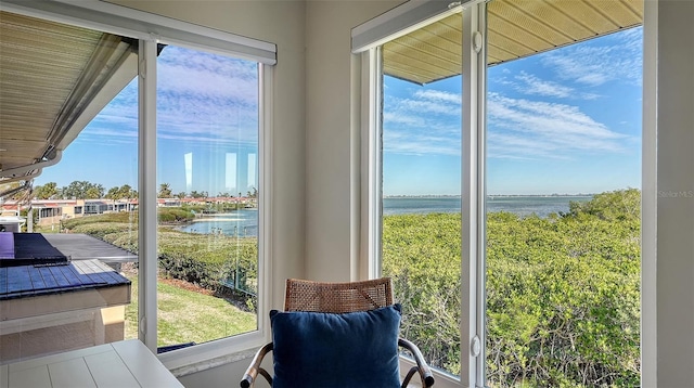 entryway featuring a water view