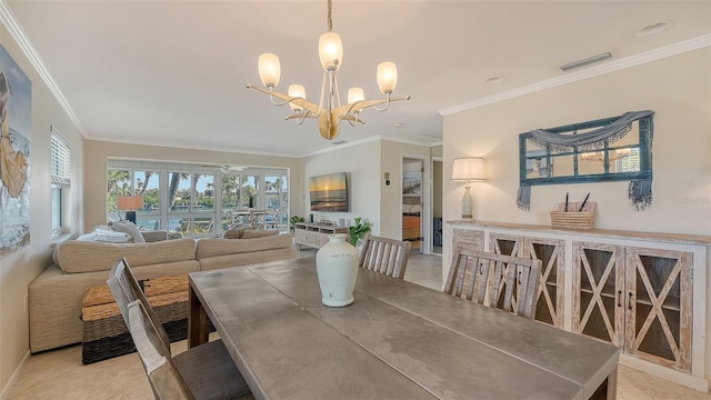 dining space featuring ornamental molding, light tile patterned floors, and an inviting chandelier