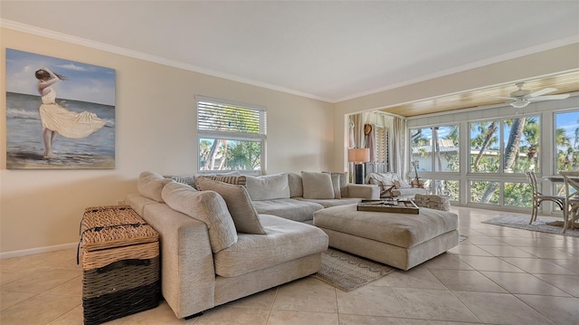 tiled living room with ceiling fan, crown molding, and a healthy amount of sunlight