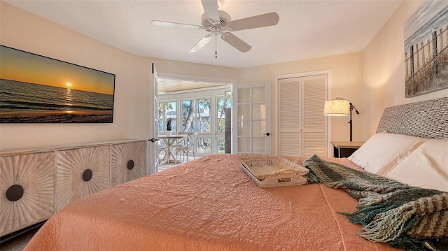 bedroom featuring ceiling fan and a closet