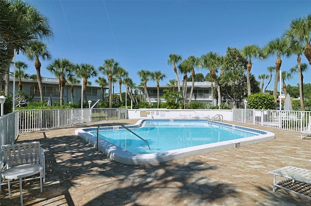 view of swimming pool featuring a patio