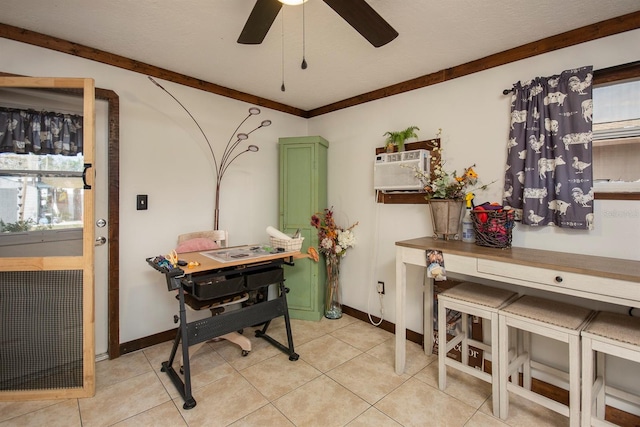 tiled dining space featuring ceiling fan and crown molding