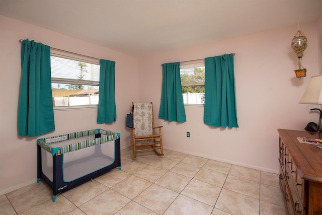 sitting room with light tile patterned floors