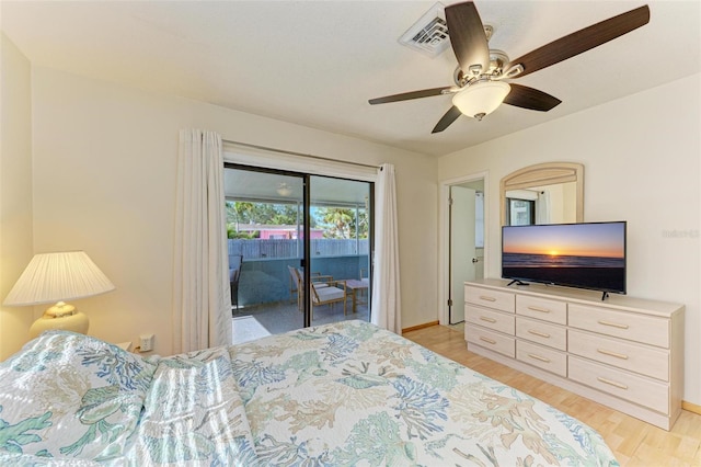 bedroom with light hardwood / wood-style floors, ceiling fan, and access to outside