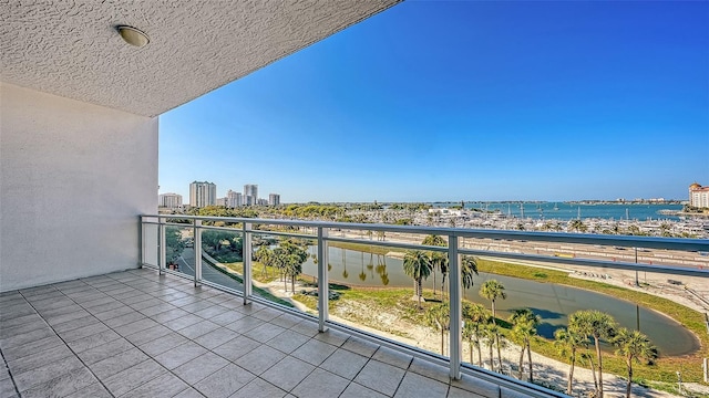 balcony featuring a water view