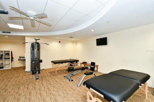 exercise area with carpet and ceiling fan