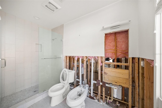 bathroom featuring a bidet, toilet, and walk in shower