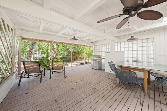 wooden terrace featuring area for grilling and ceiling fan