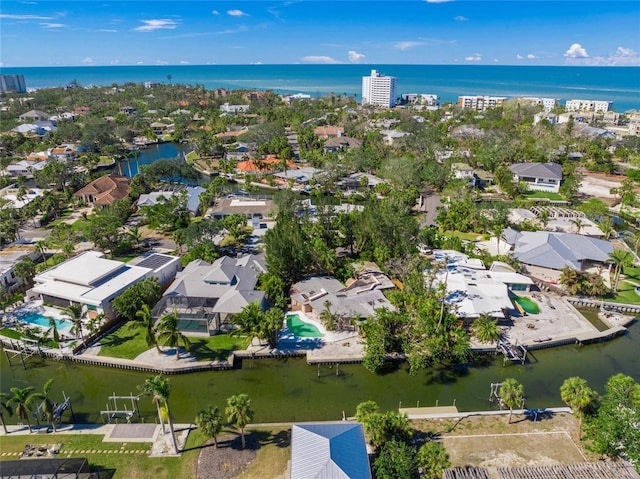 bird's eye view with a water view