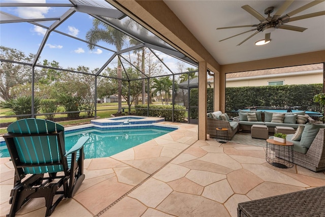 view of swimming pool featuring a lanai, an outdoor hangout area, a patio, and an in ground hot tub