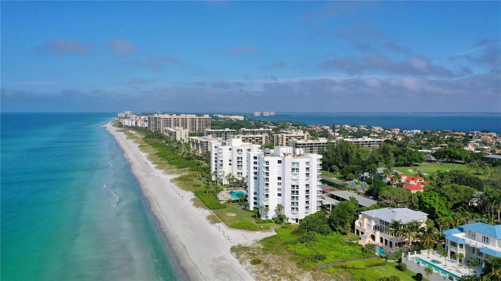 aerial view with a beach view and a water view